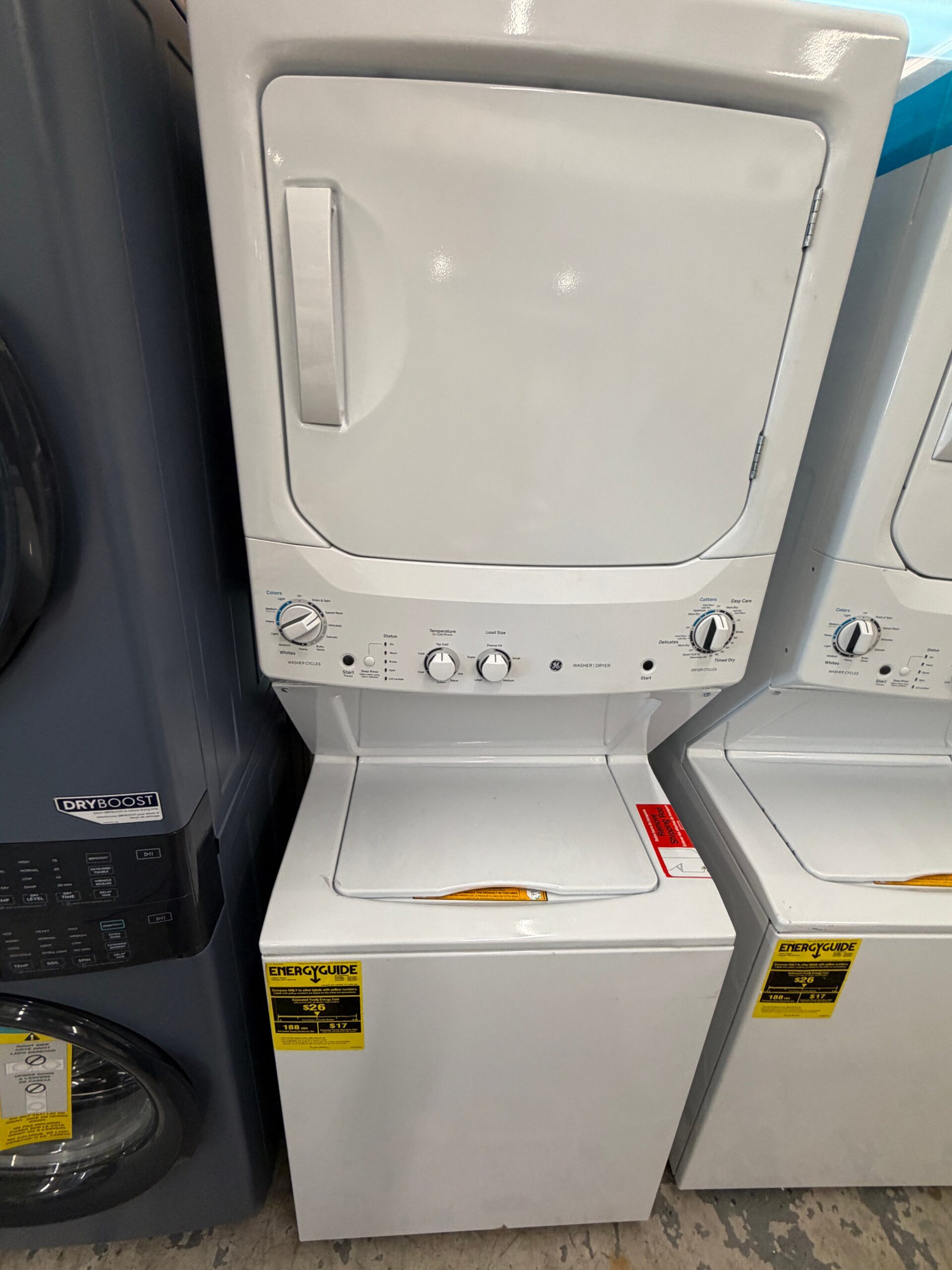 14174caec93a9f89fc93d13cd98a9aa17f47c83502ccfcaf2582d3cd5b4db1b2 GE Unitized Spacemaker Stacked Washer and Electric Dryer in White - Image 1