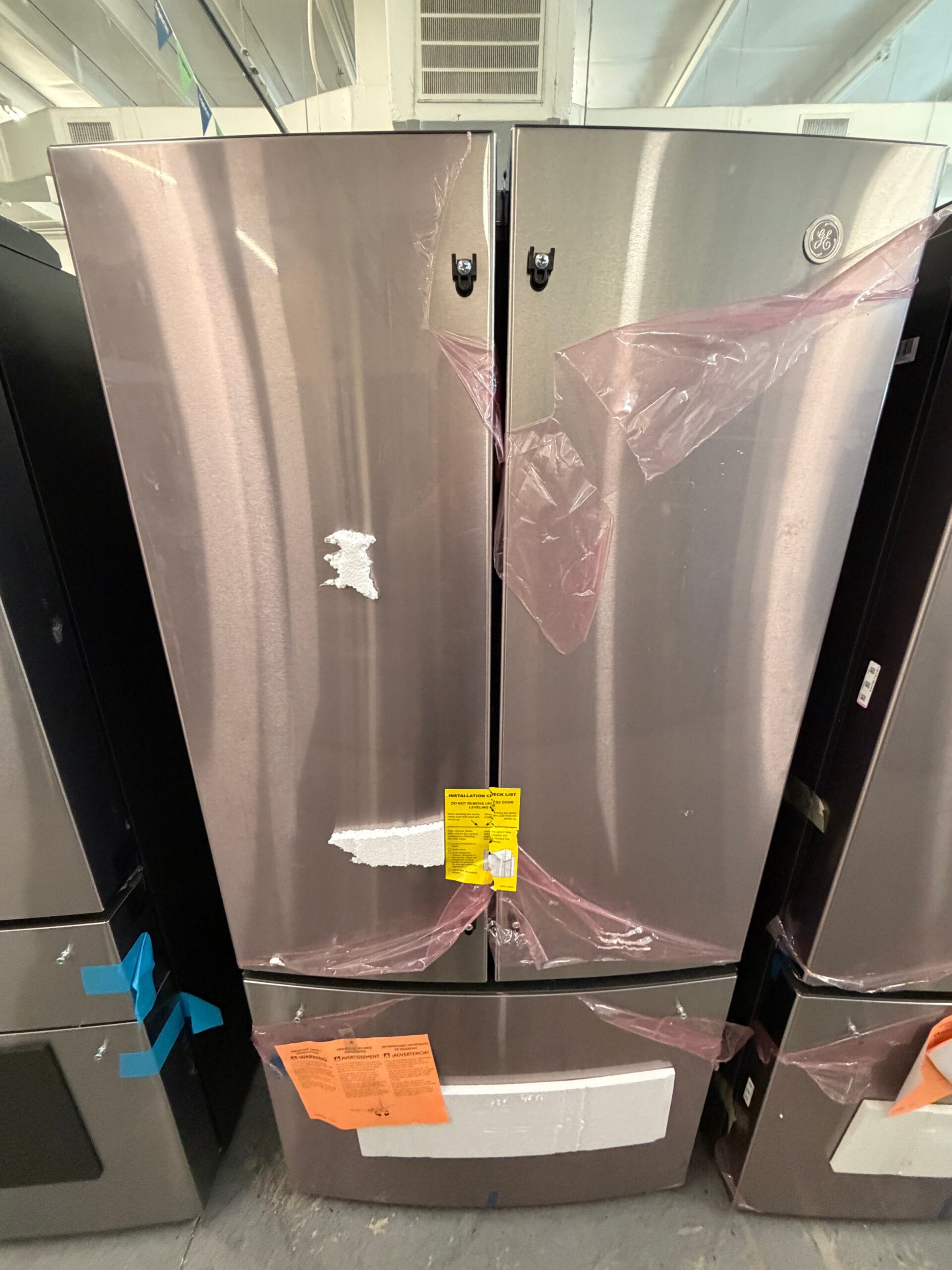 775e213e400105532adaf7a6093ef6879e56c2f1dfbb5efc79d6a1808c110942 GE 24.7 Cu. Ft. French Door Refrigerator in Fingerprint Resistant Stainless Steel - Image 1