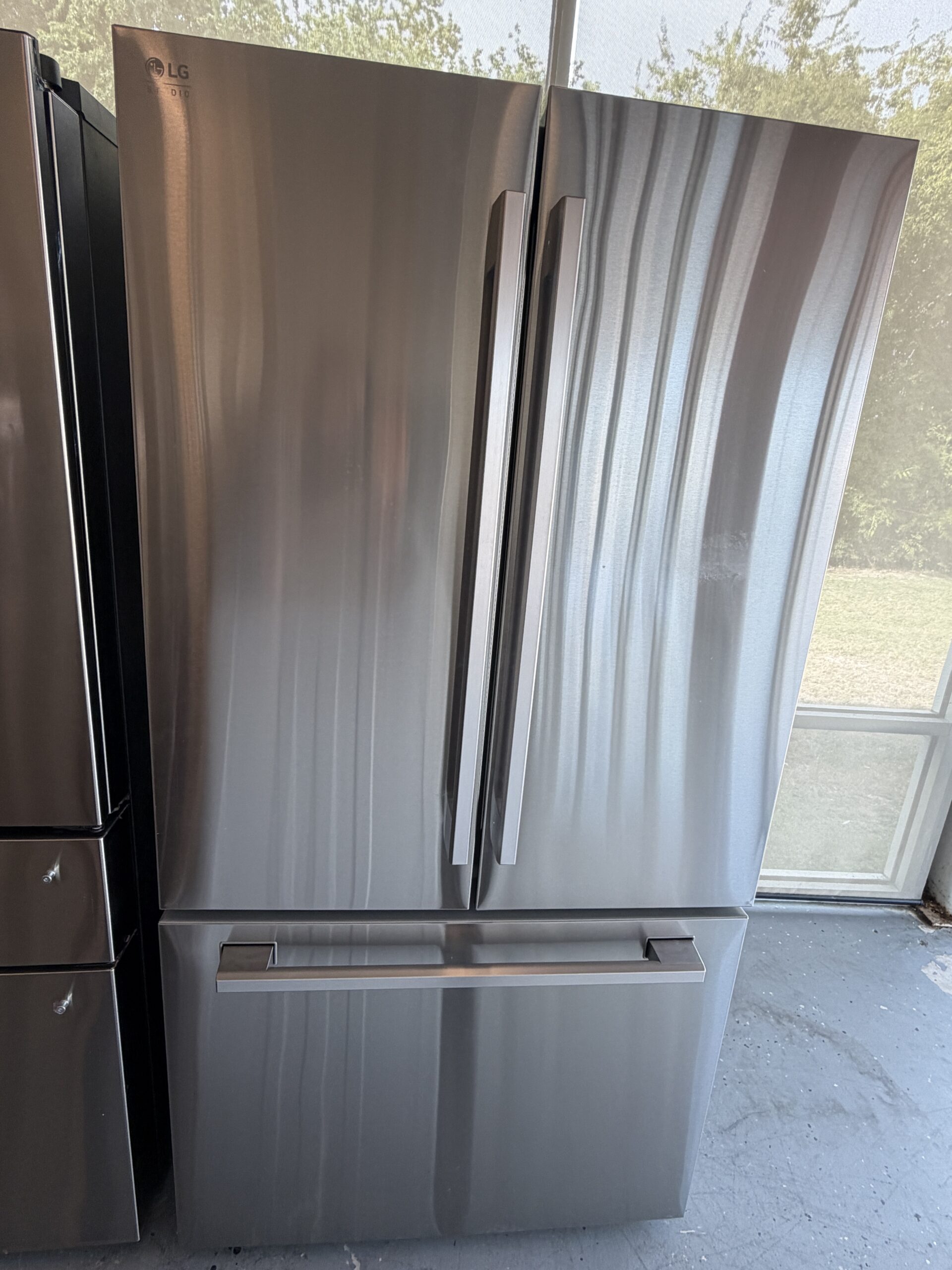 IMG_7409 STUDIO 27 cu. ft. SMART Counter Depth 3-Door French Door Refrigerator in PrintProof Stainless Steel with Water and Ice - Image 1
