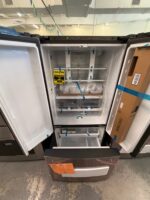 GE 24.7 Cu. Ft. French Door Refrigerator in Fingerprint Resistant Stainless Steel - Image 2
